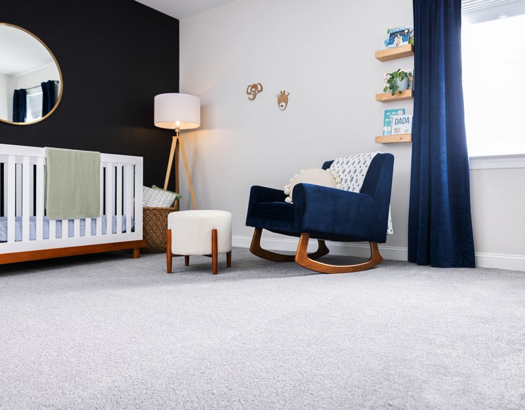 Blue chair on white carpet | Westport Flooring and Interiors