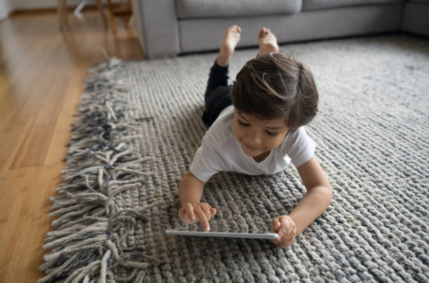 Girl lying on floor | Westport Flooring and Interiors